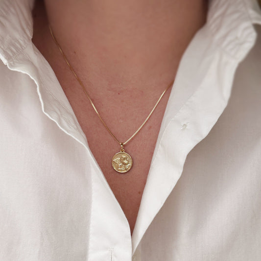 Model Wearing Angel Coin Pendant on Chain
