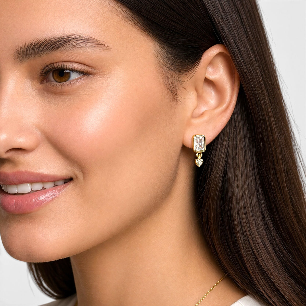 Baguette CZ Heart Drop Stud Earrings on Model
