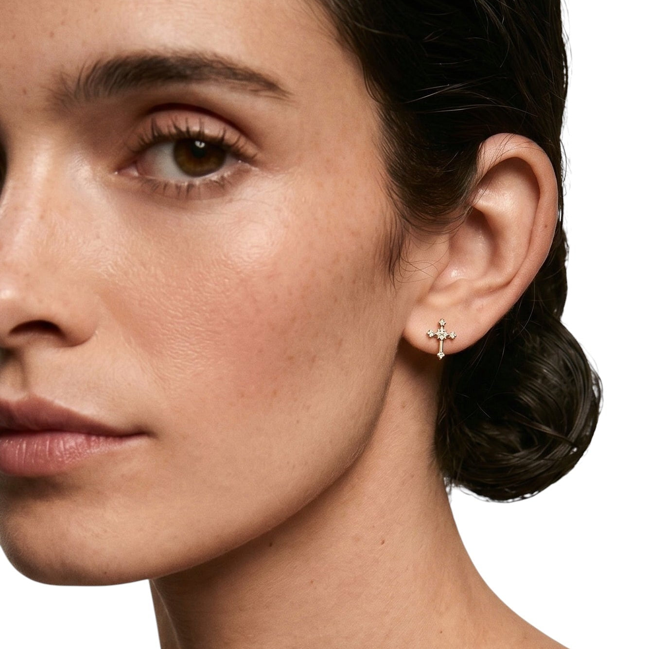 CZ cross studs styled on ear
