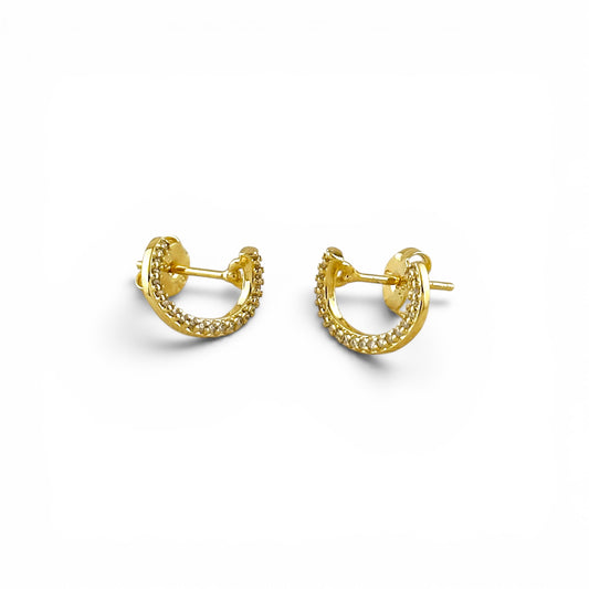 Close-up of pavé CZ stones on half-moon stud earrings
