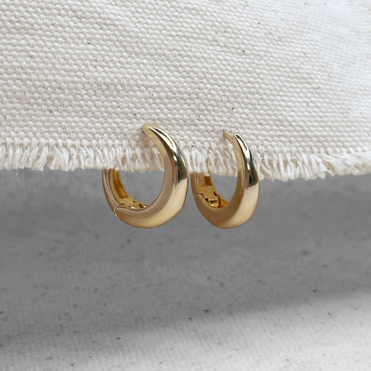 British Closure Huggie 12mm Hoop Earrings in 18K gold-filled, view 4
