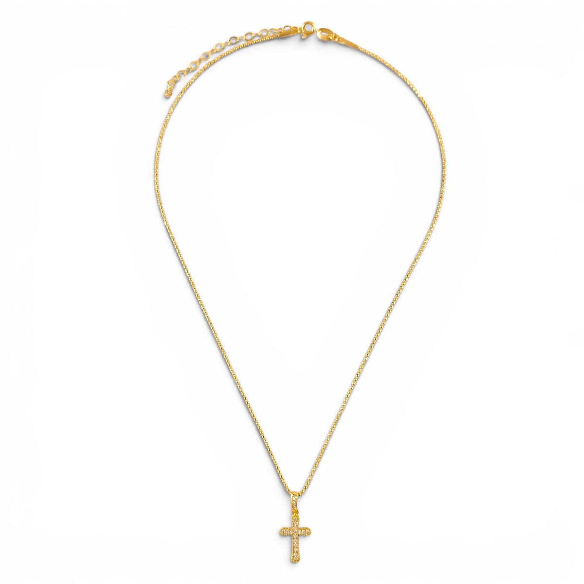 Pavé cross necklace showing delicate beaded chain