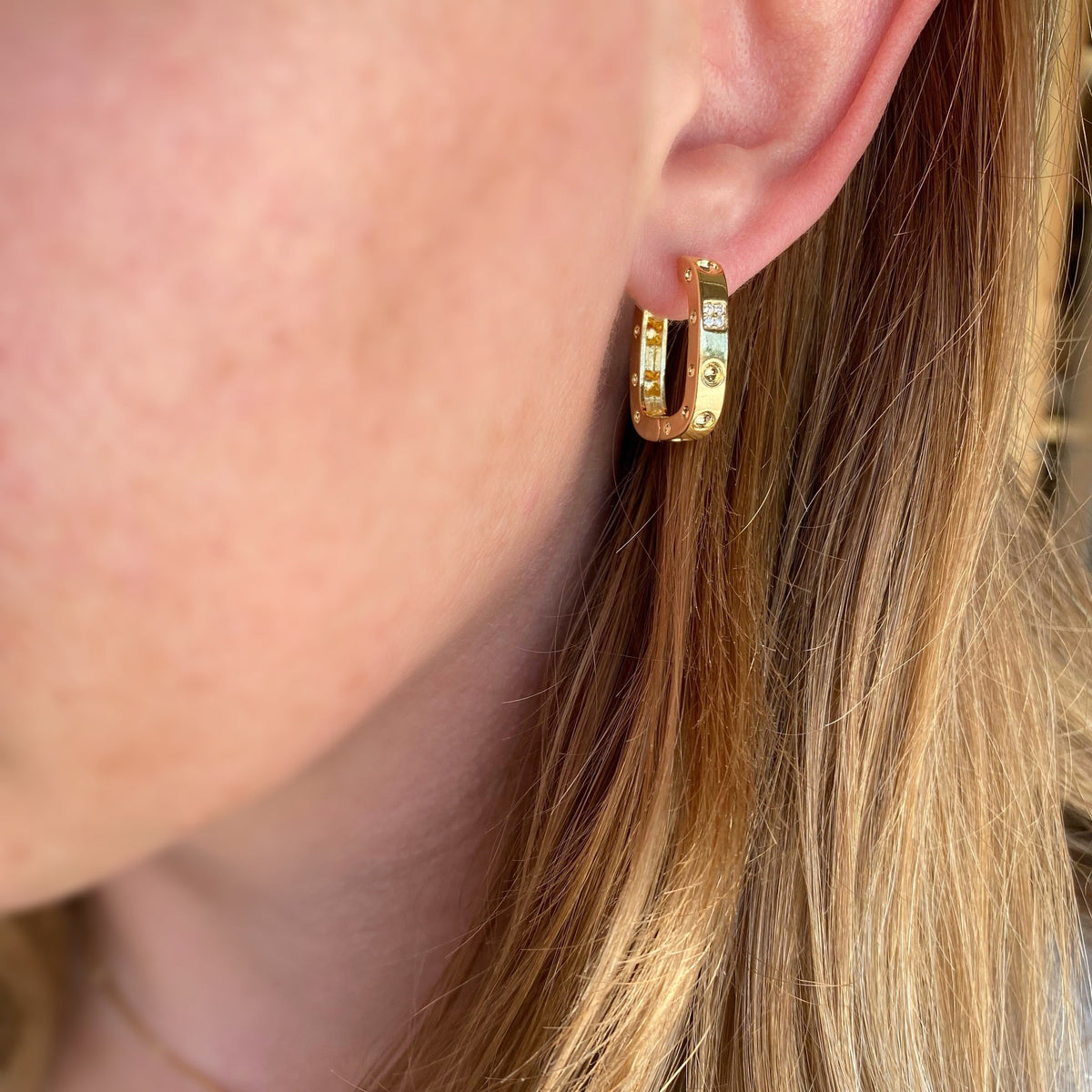 Skillus Shape CZ Huggie Hoop Earrings on Ear