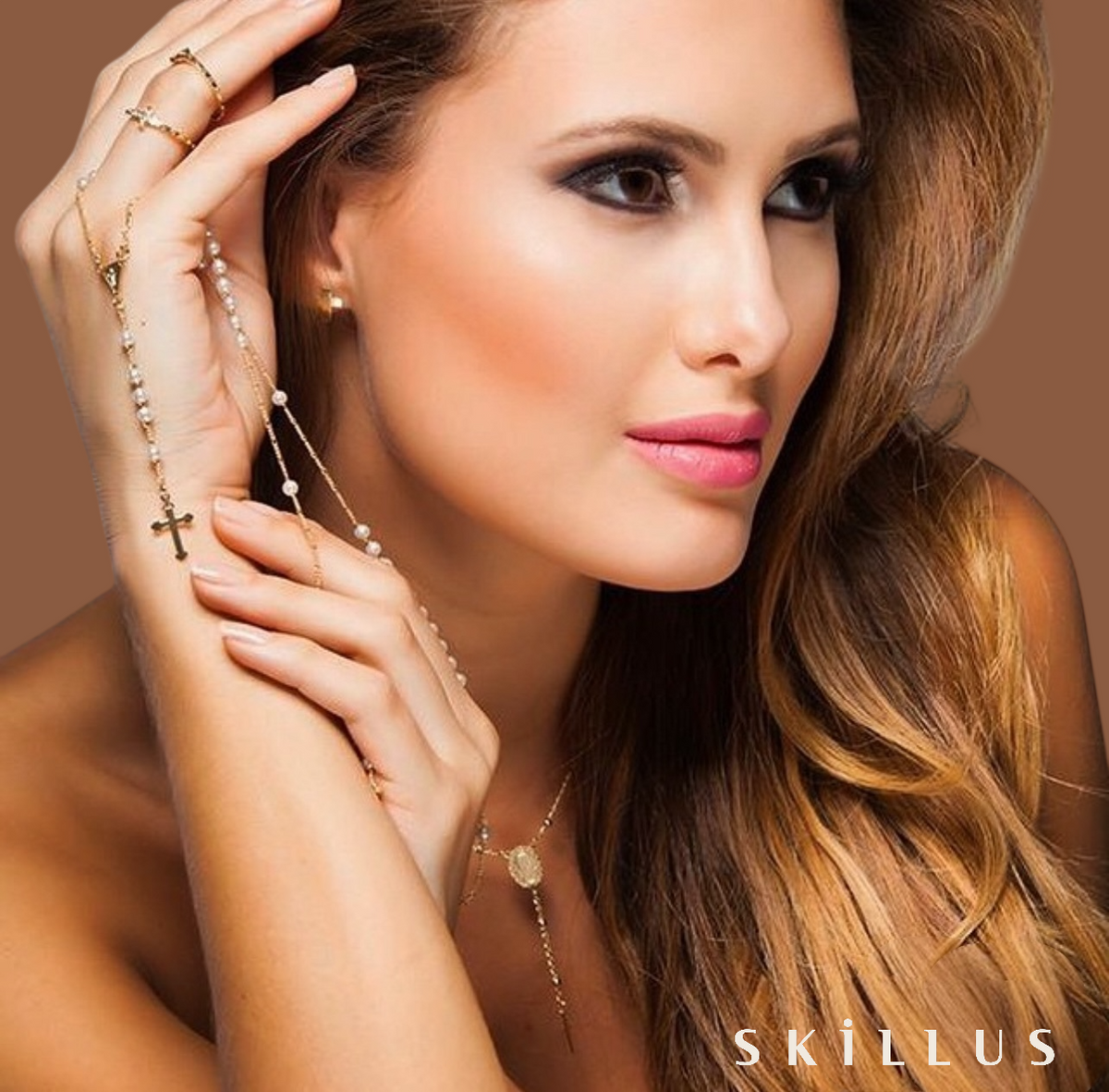 Woman wearing 18K gold filled rosary necklace with cross pendant by Skillus