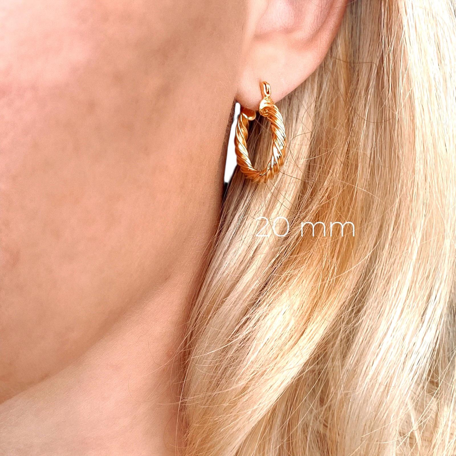 Skillus 18K gold-filled hoop earrings on model