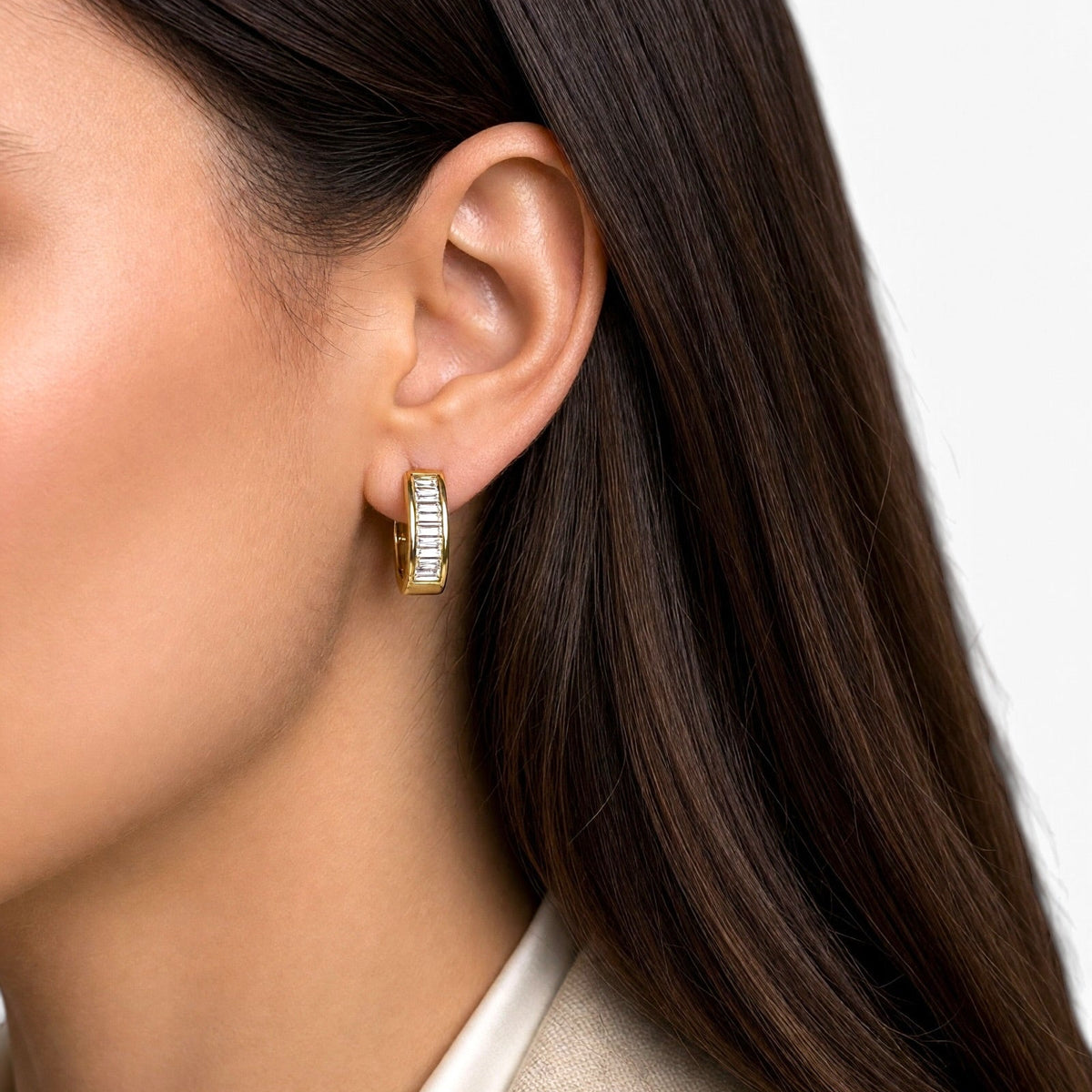 Baguette CZ Huggie Hoop Earrings on Model Sideview