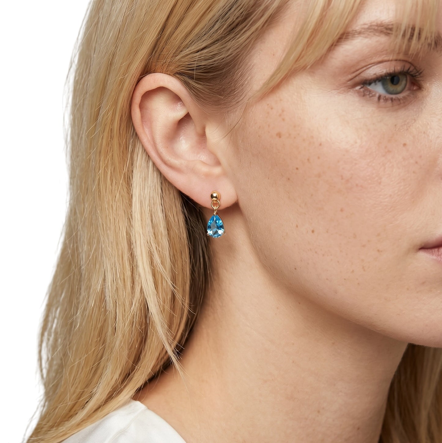Blue Teardrop CZ Earrings on Model