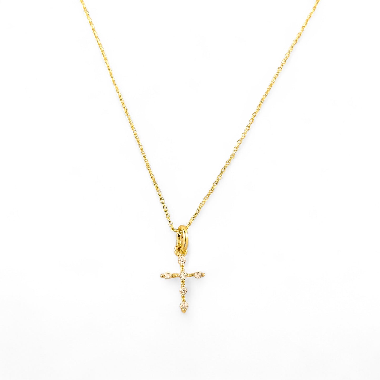 CZ Cross Pendant Necklace in 18K Gold Filled on white background
