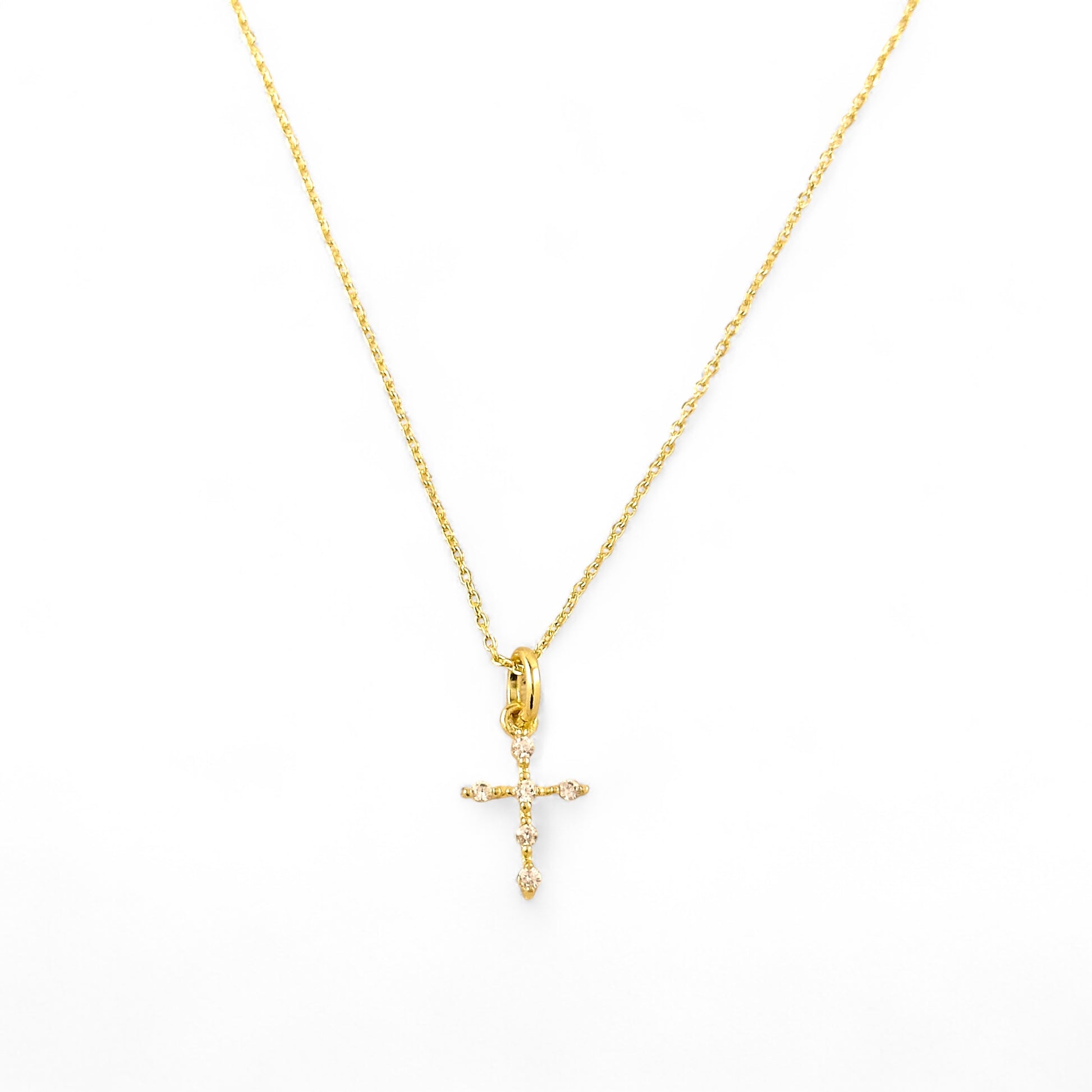 CZ Cross Pendant Necklace in 18K Gold Filled on white background