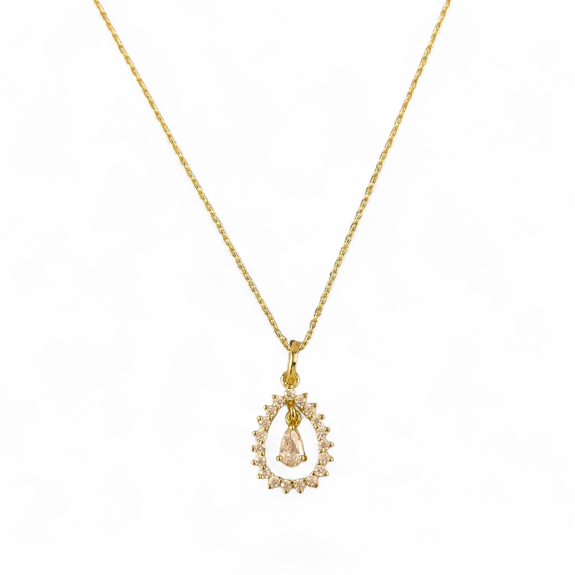 Pear CZ Halo Pendant Necklace in 18K Gold Filled on white background