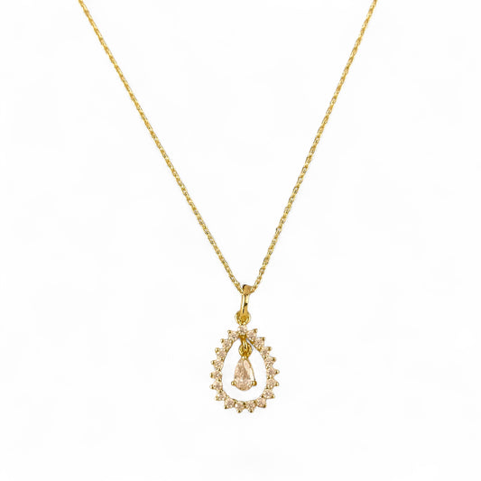 Pear CZ Halo Pendant Necklace in 18K Gold Filled on white background