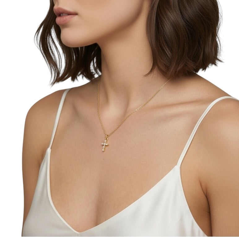 CZ cross pendant styled on model