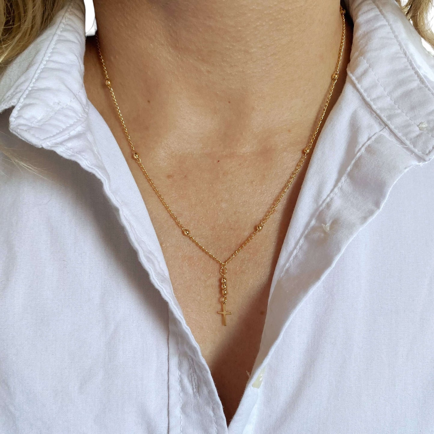 Model wearing Cross Beaded Chain Necklace in 18K Gold Filled
