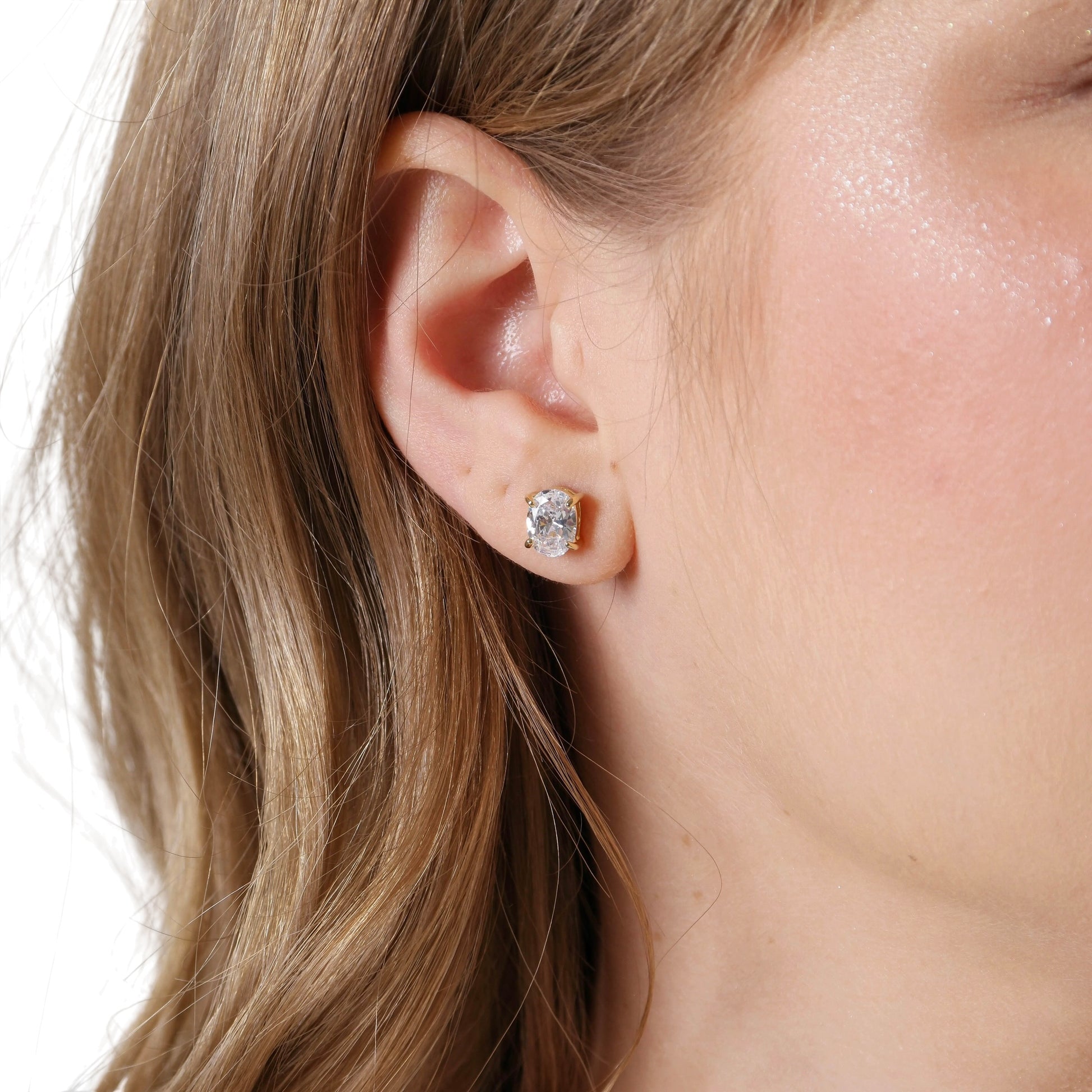 Oval Clear CZ 7mm 18K Gold Filled Stud Earrings on model