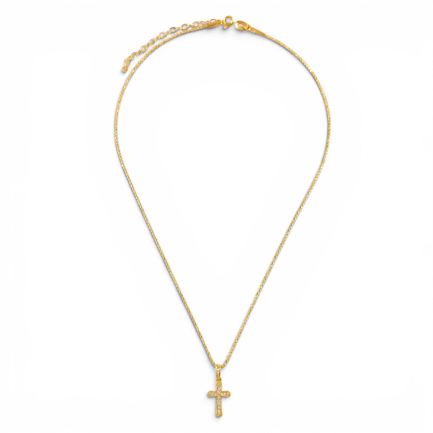 Pavé cross necklace showing delicate beaded chain