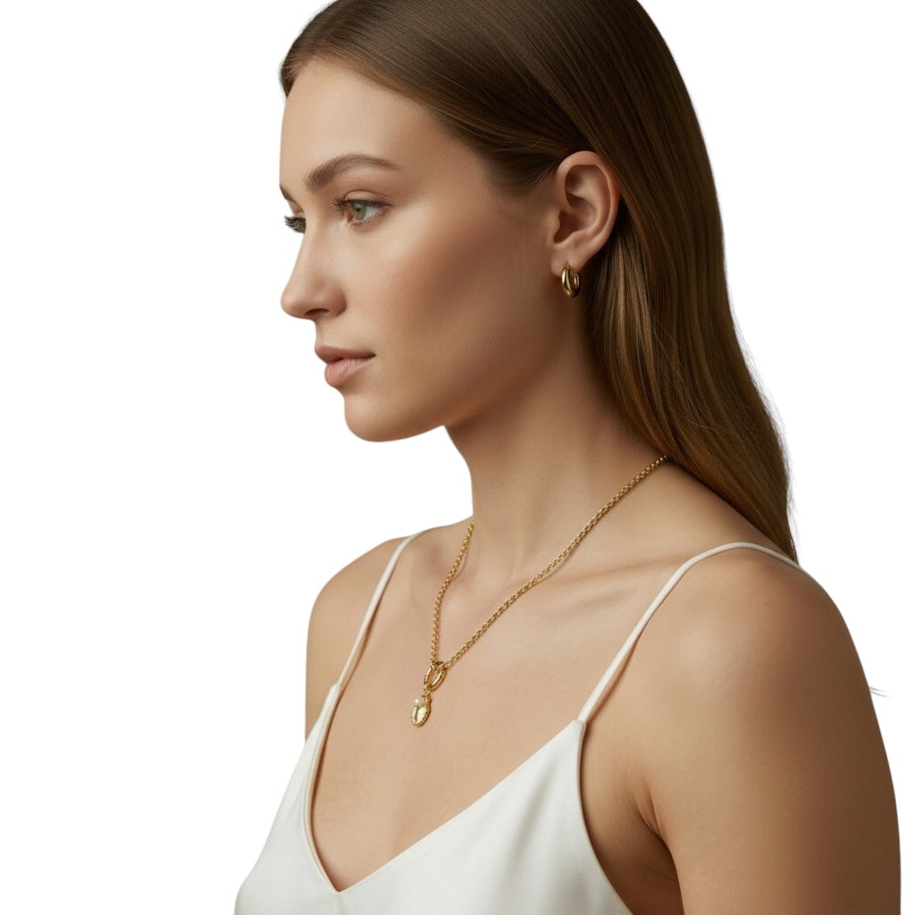 Pearl shell charm styled on model