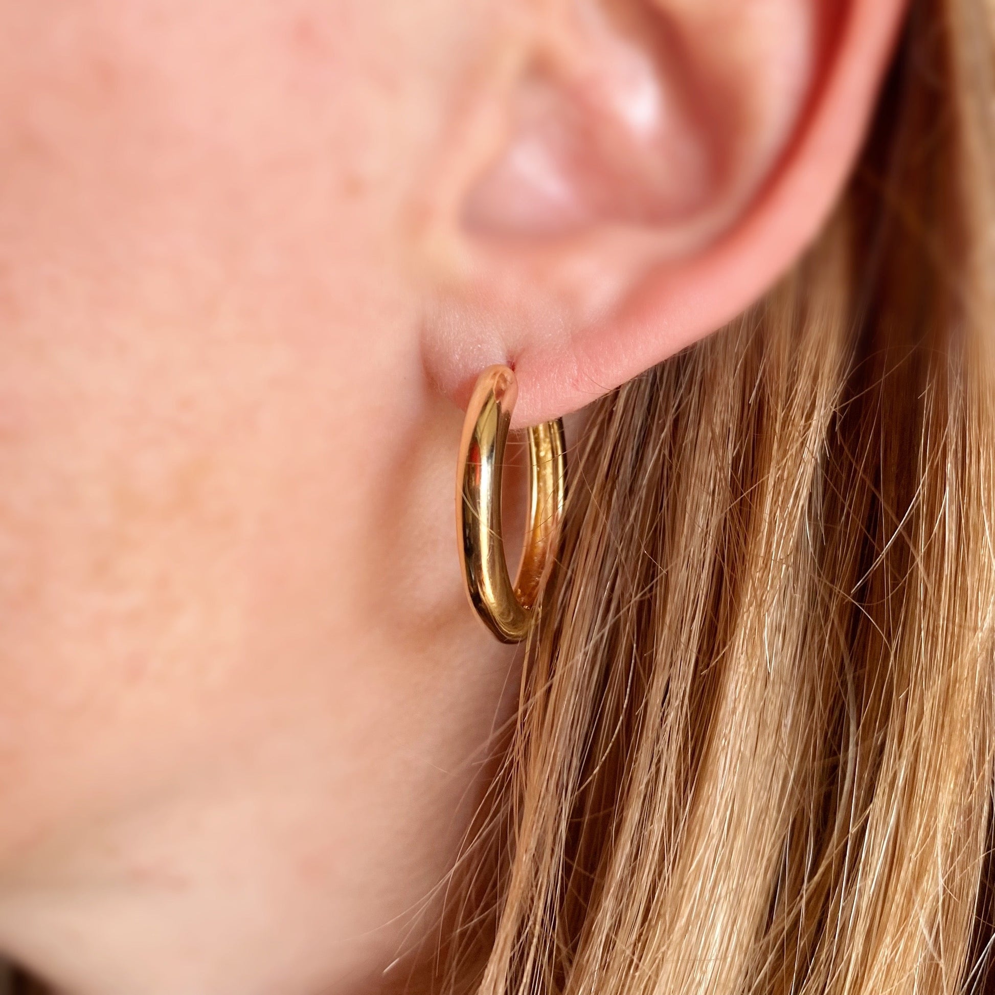 Polished Round Huggie Hoop Earrings on Model