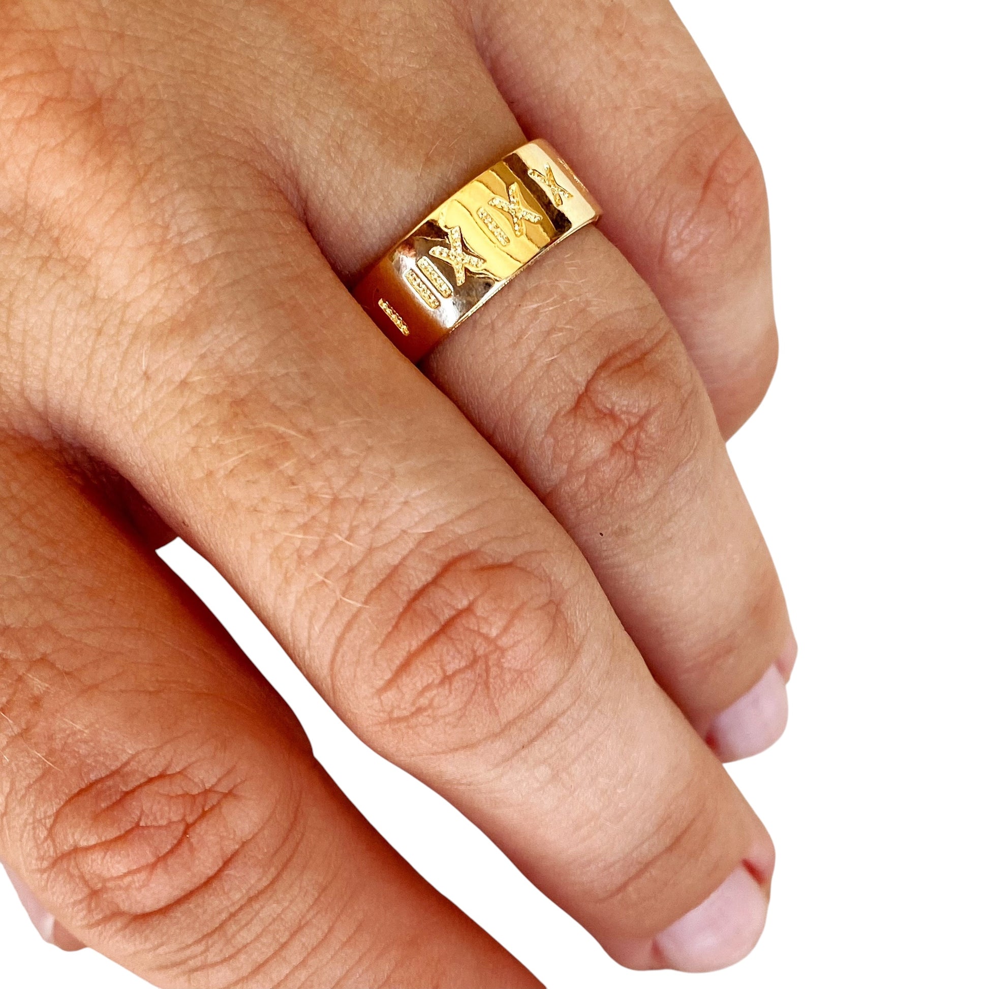 Roman Numeral Engraved Ring on hand