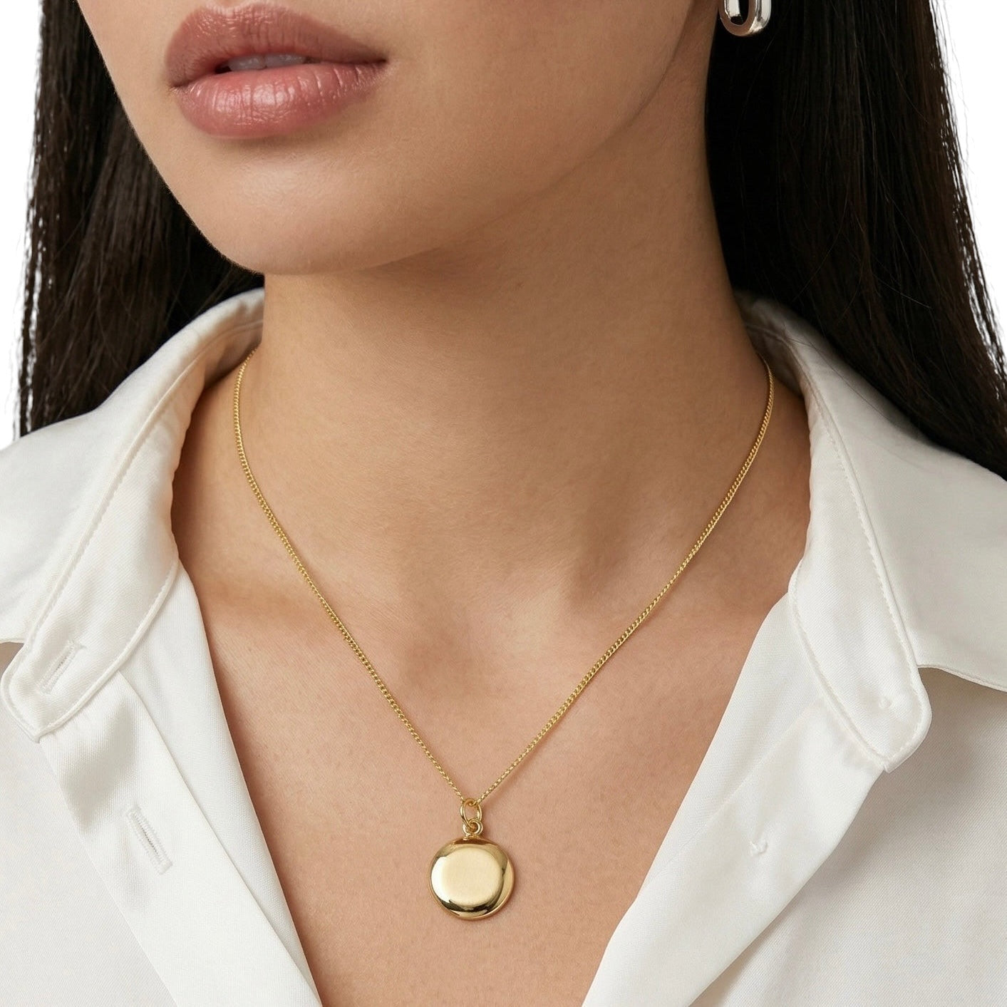 Round locket pendant styled on model