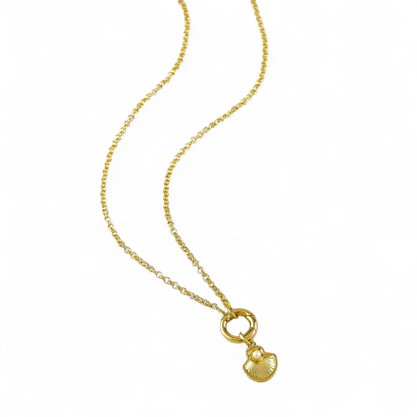 Scallop charm with pearl styled on delicate chain