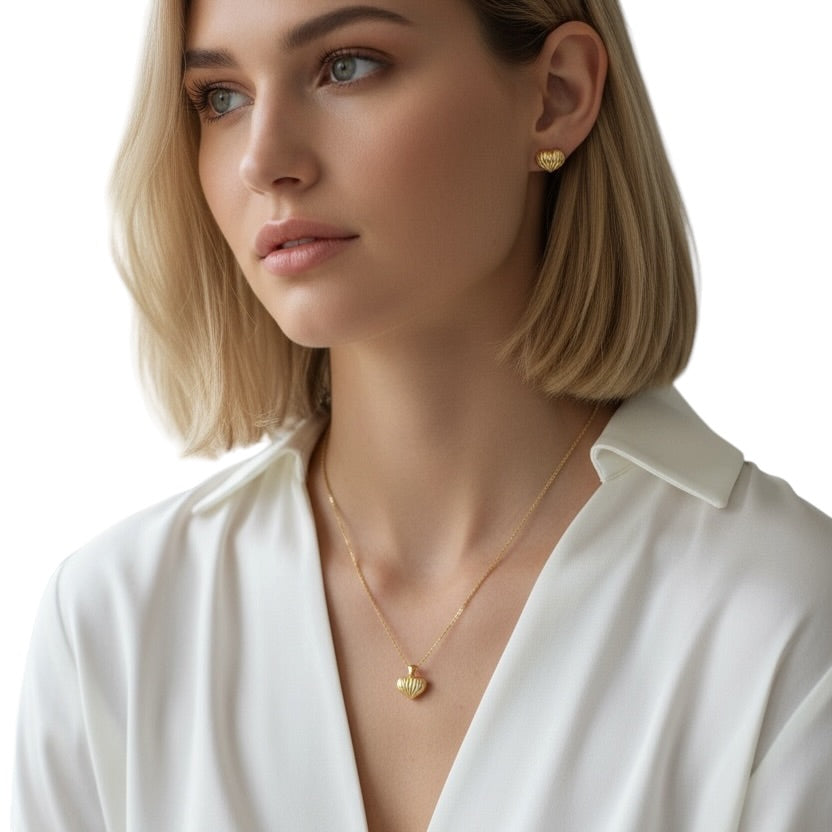 Scalloped heart studs styled on ear