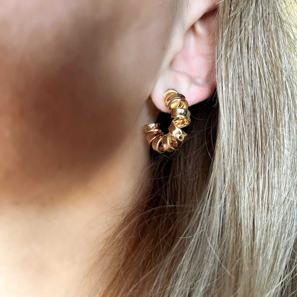Skillus 18k Gold Filled Twisted Ribbon Open Hoop Earrings on Model