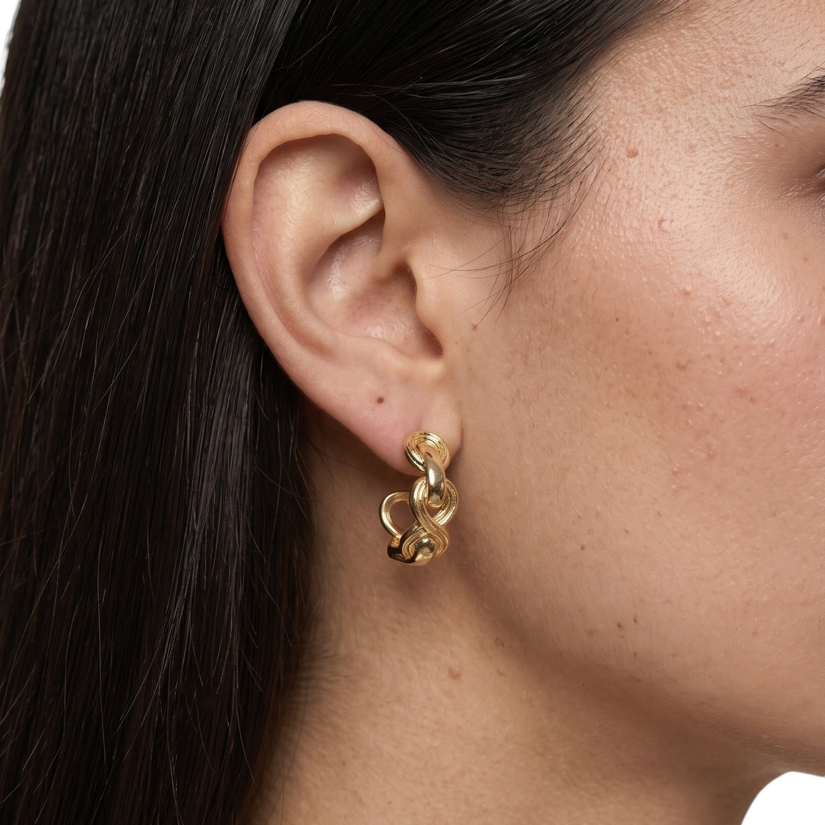 Skillus Braided Infinity Open Hoop Earring on Ear