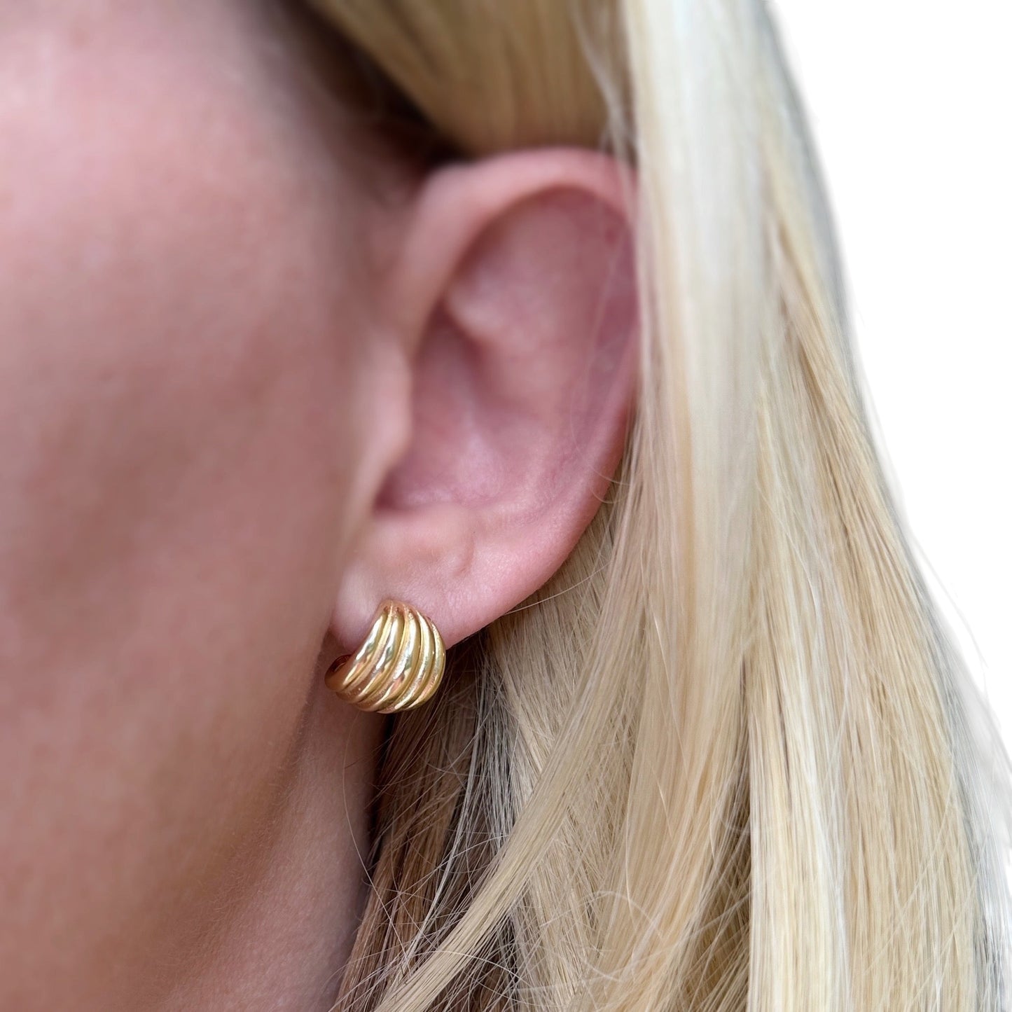 Skillus Curve Open Hoop Earrings on Ear