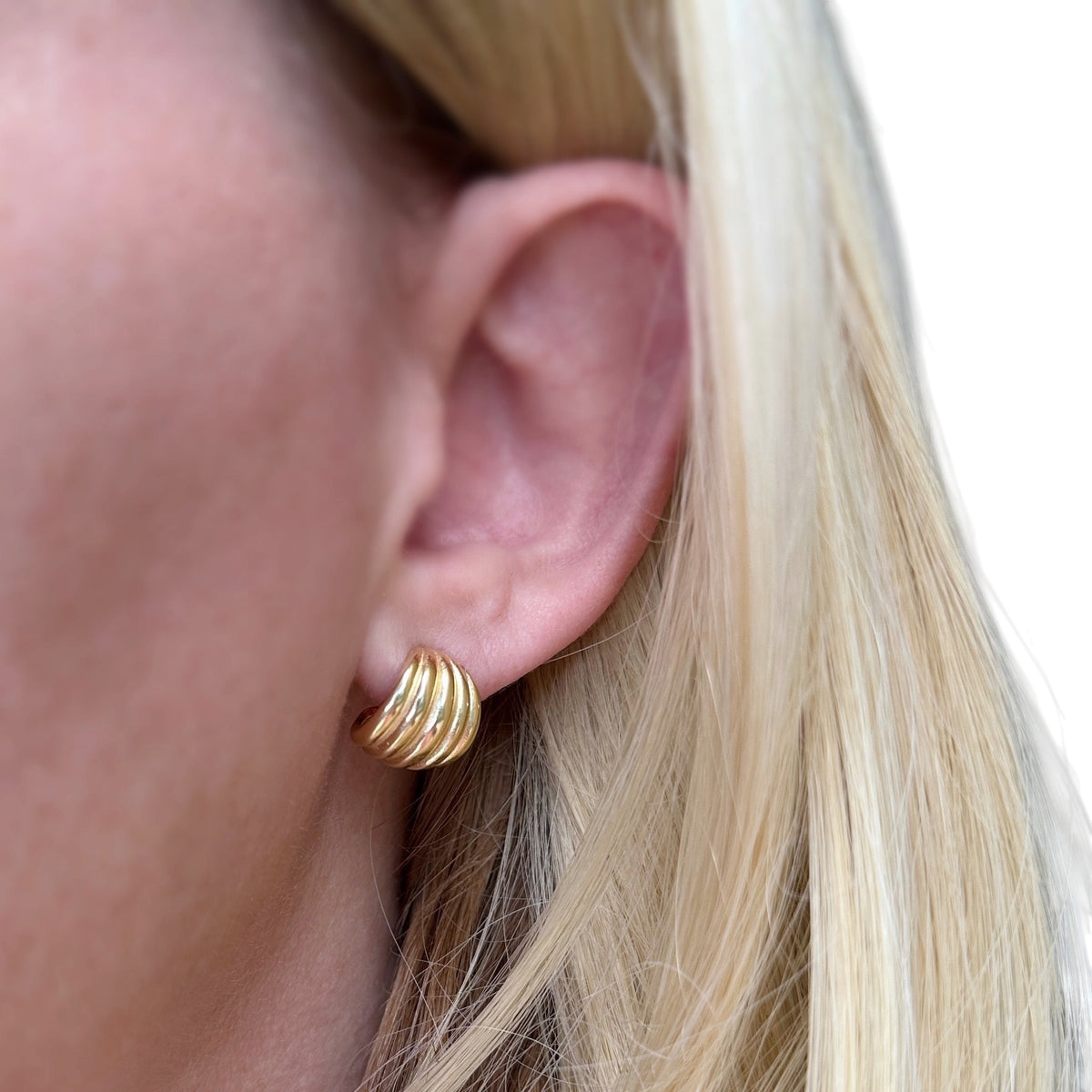 Skillus Curve Open Hoop Earrings on Ear