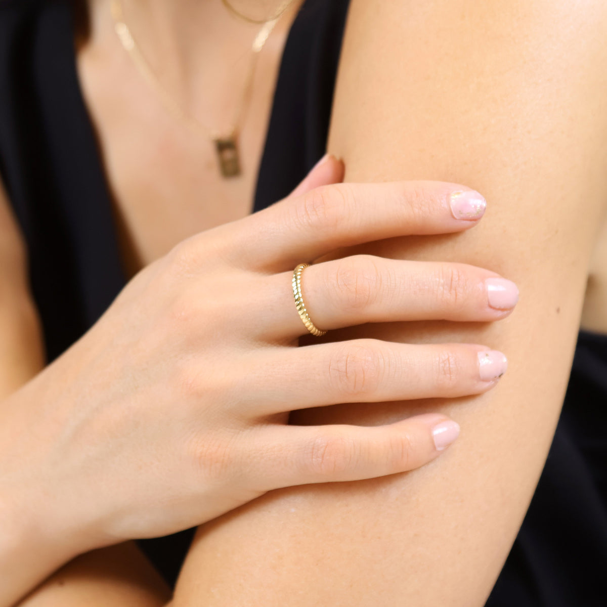 Skillus Twisted Band Ring on Model Closeup