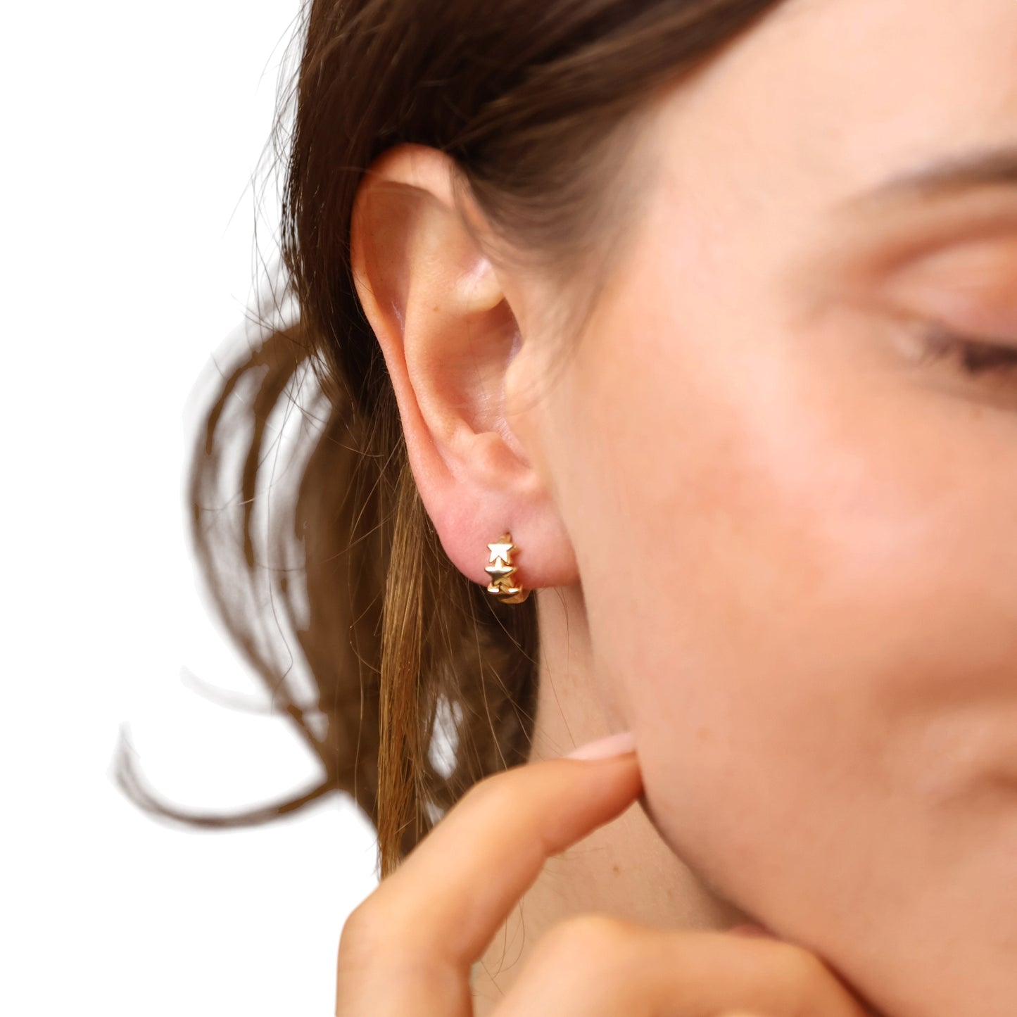 Small Star Huggie Hoop Earrings on Modela
