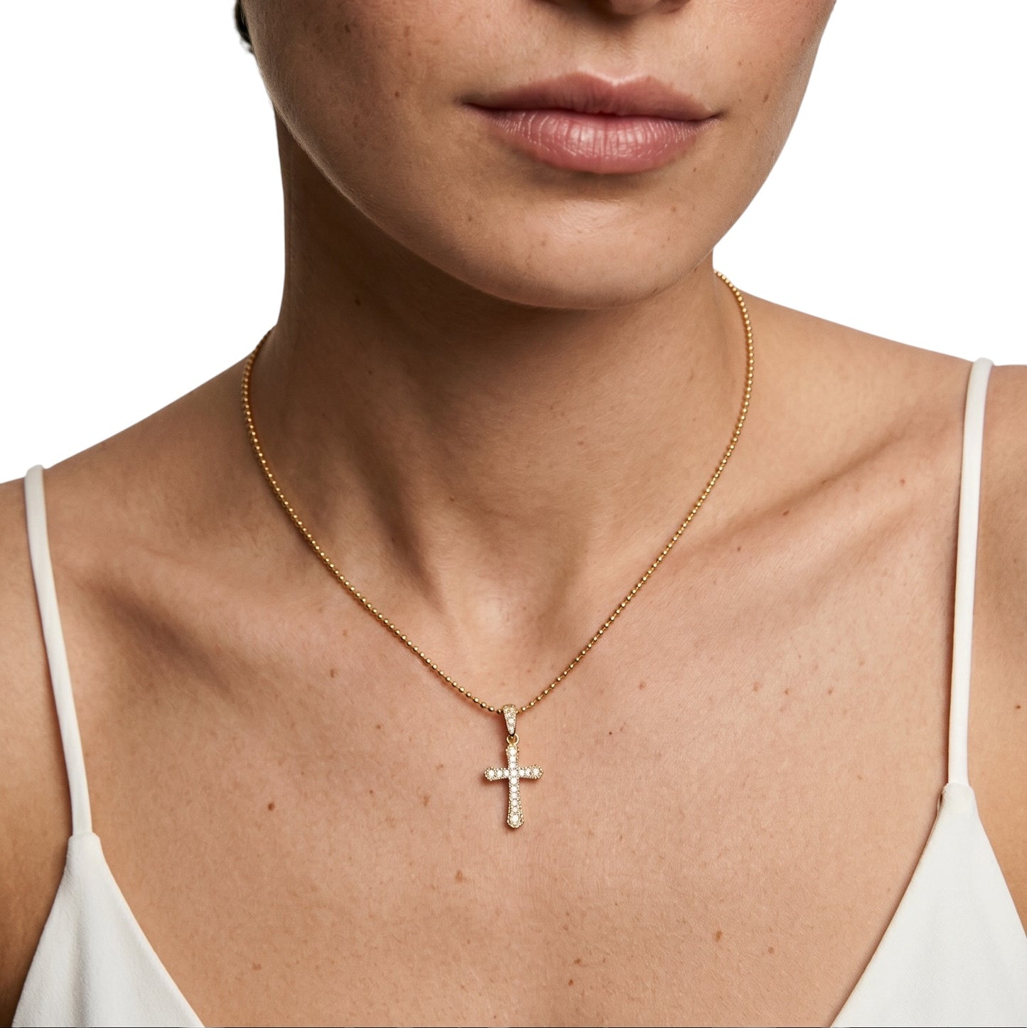 Woman wearing Cross Pavé CZ Necklace at collarbone
