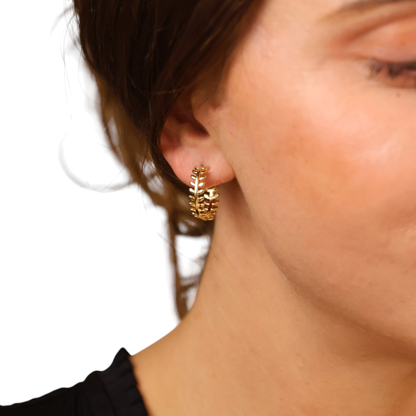 Woman wearing Large Leaf Huggie Hoop Earrings 