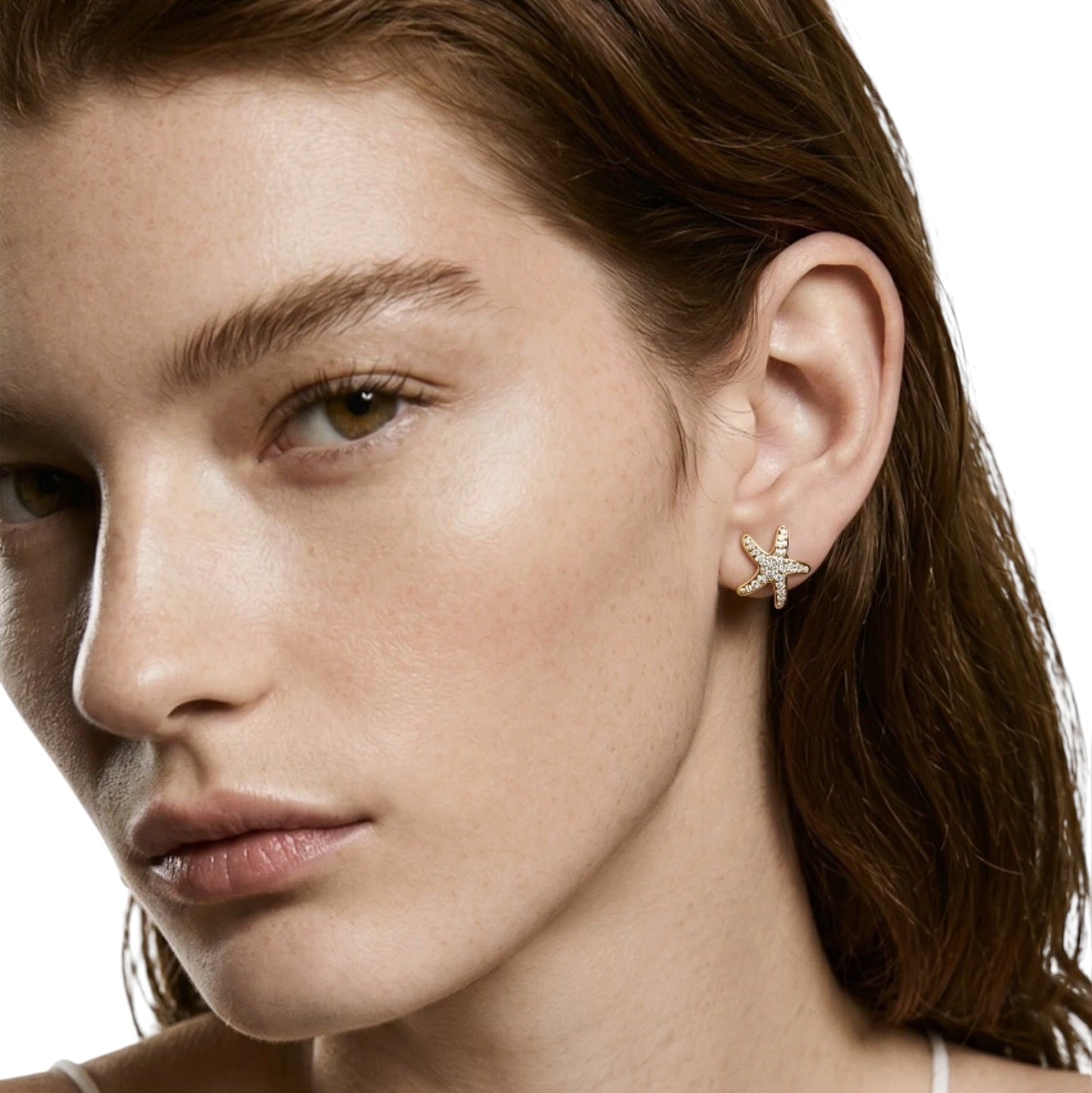 Woman wearing Pavé CZ Sea Star Stud Earrings