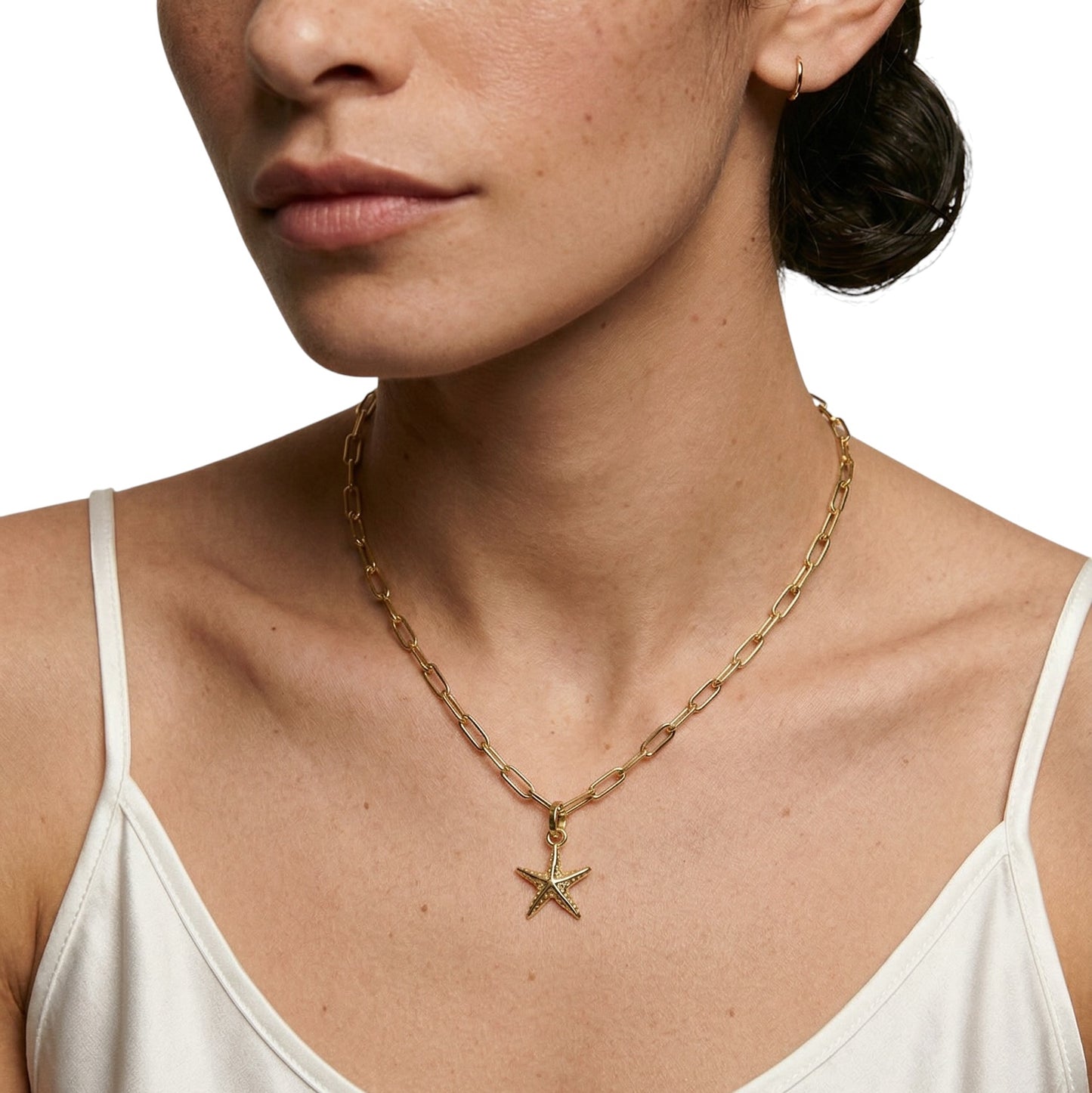 Woman wearing Sea Star Charm on necklace