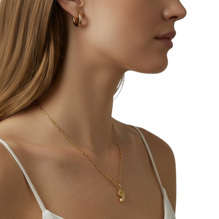Woman wearing Sundial Shell Charm Necklace