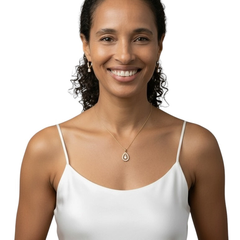 Woman wearing Teardrop CZ Halo Pendant Necklace