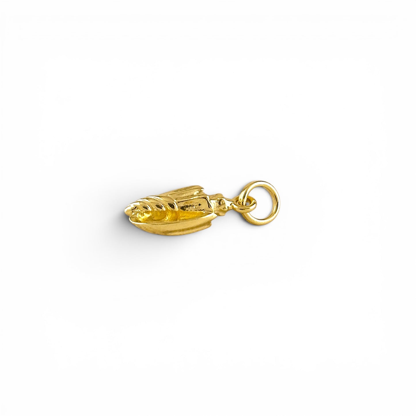 detailed texture on conch shell charm