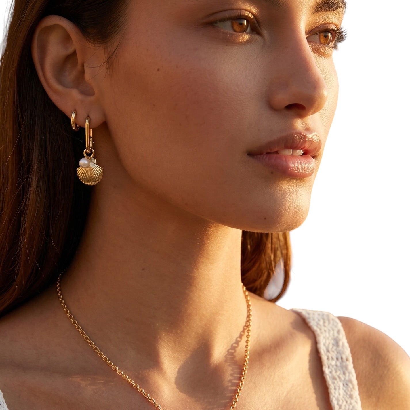 model wearing skillus Scalloped Shell Charm in 18K Gold Filled