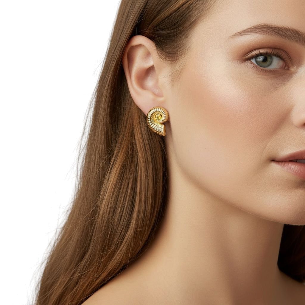 18K Gold Filled sculptural nautilus earrings on model