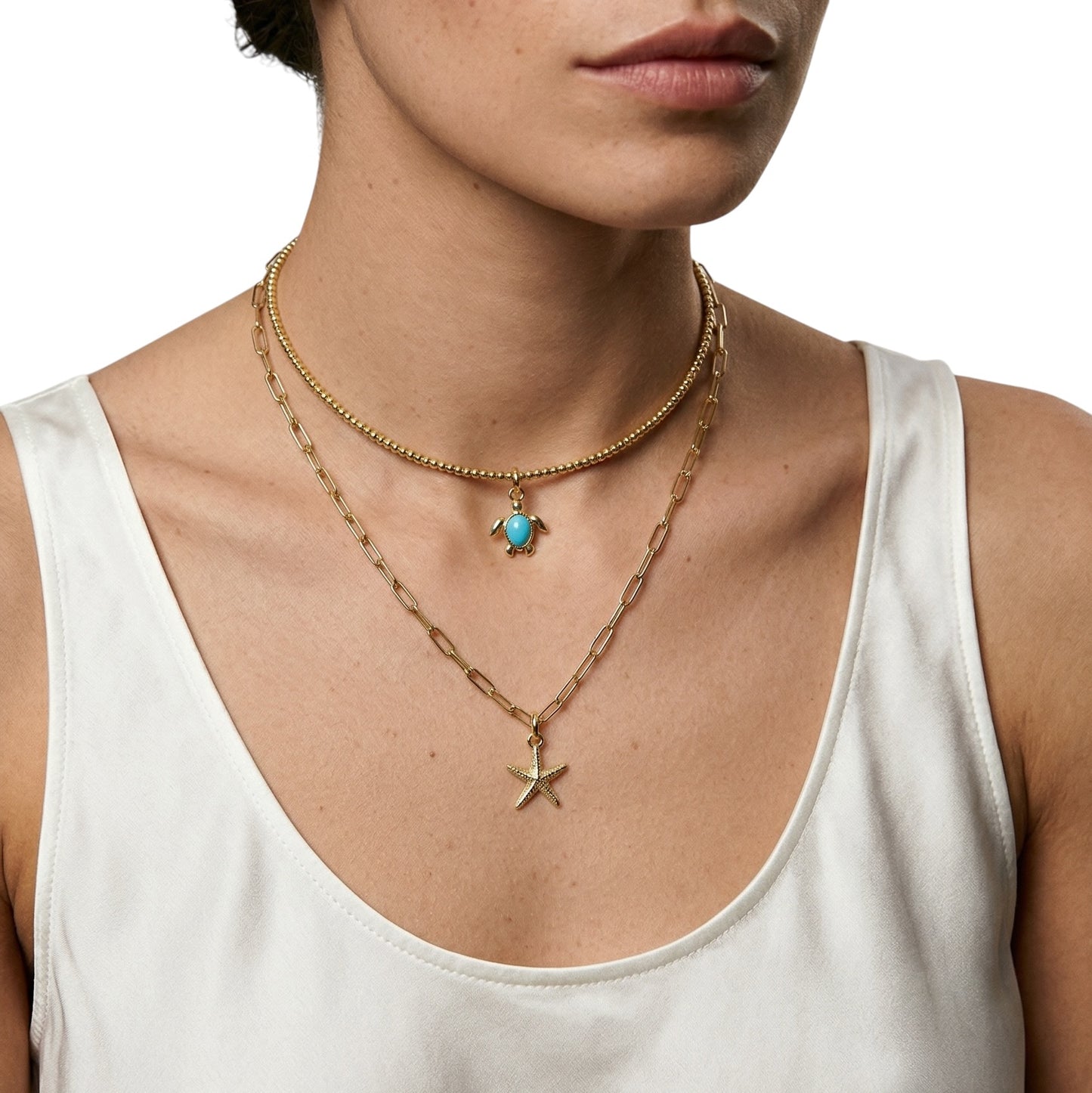 18K Gold Filled sea star charm styled on model