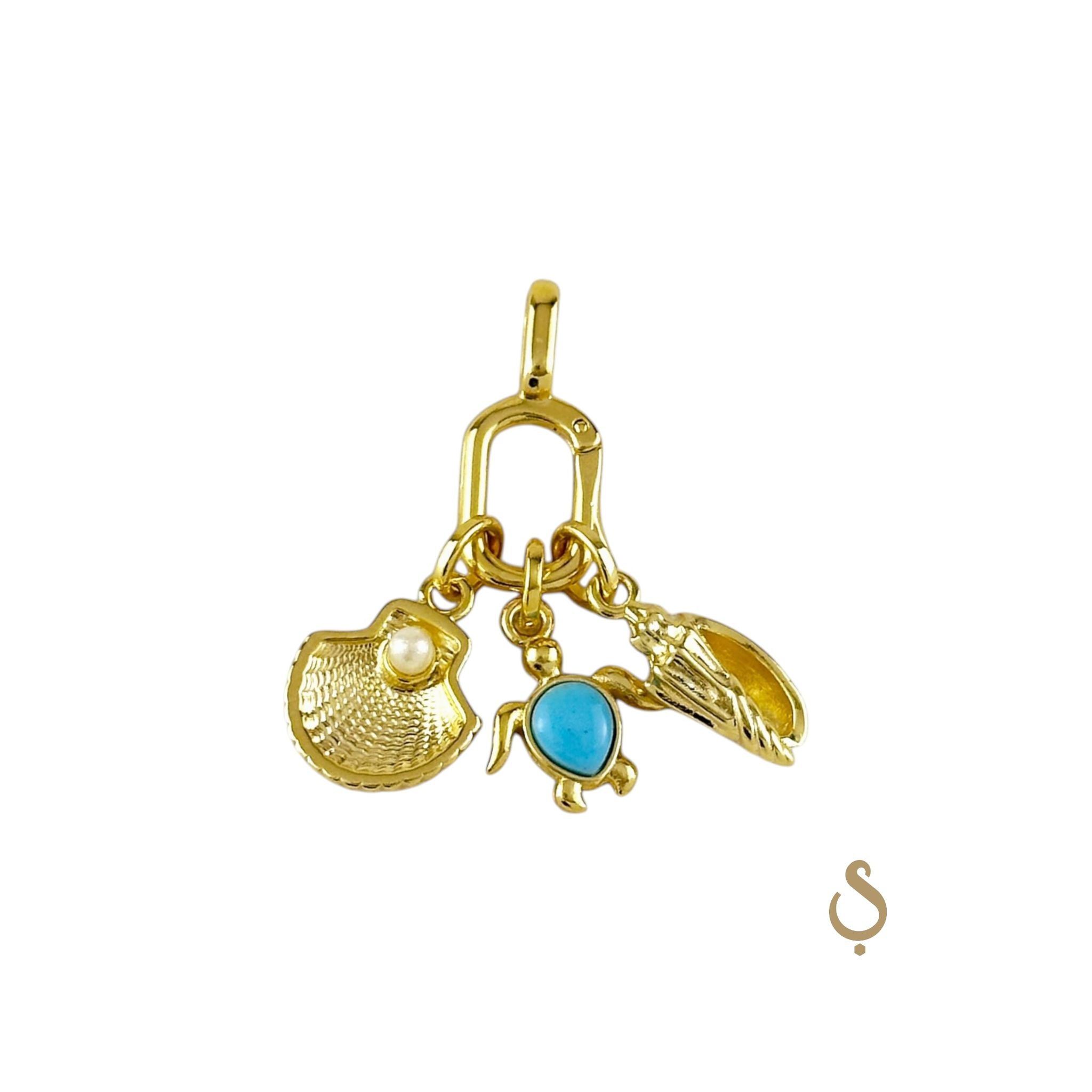 18K gold filled carabiner charm holder with shell, turtle and leaf charms by Skillus