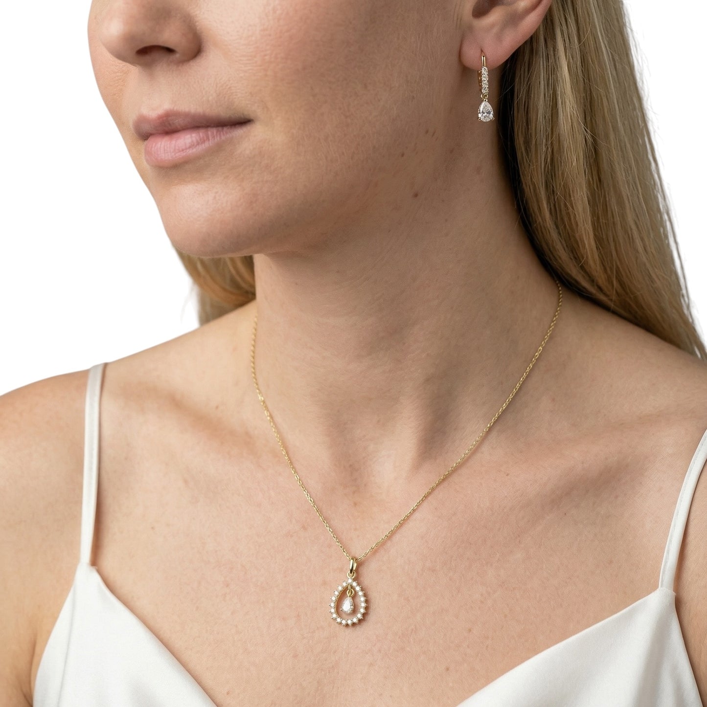 18K Gold Filled teardrop CZ earrings on model